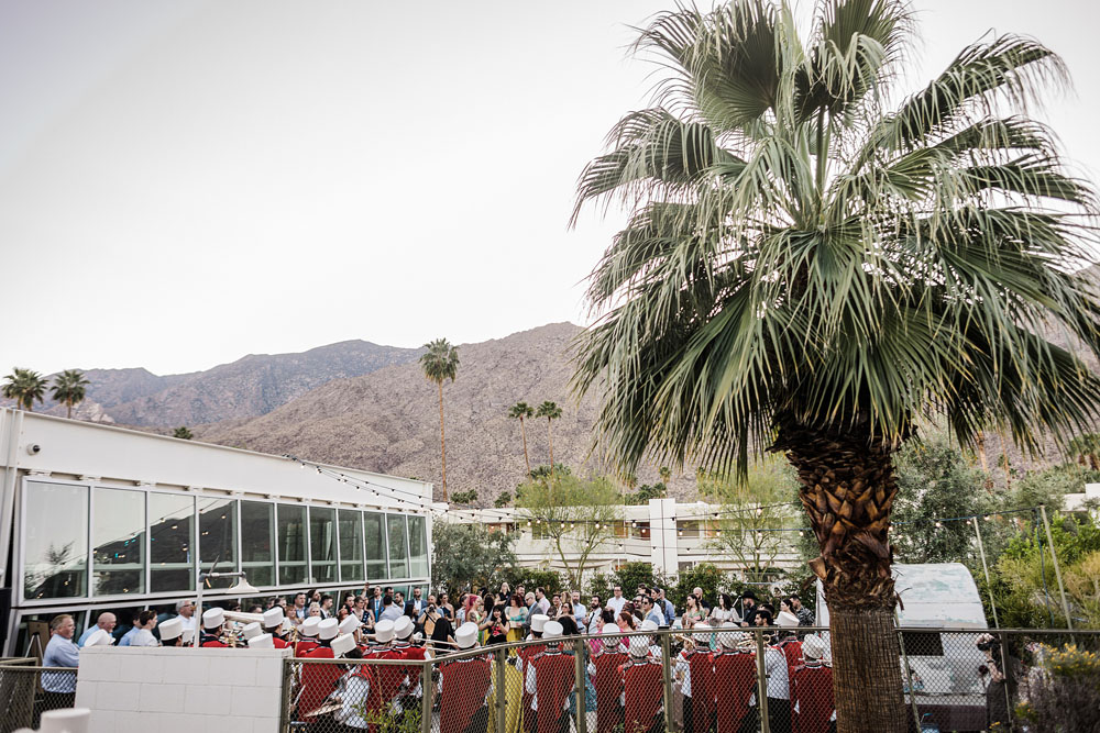 Colorful Ace Hotel Palm Springs wedding with a pool party