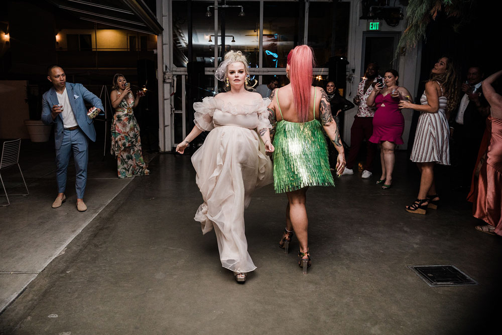 Colorful Ace Hotel Palm Springs wedding with a pool party