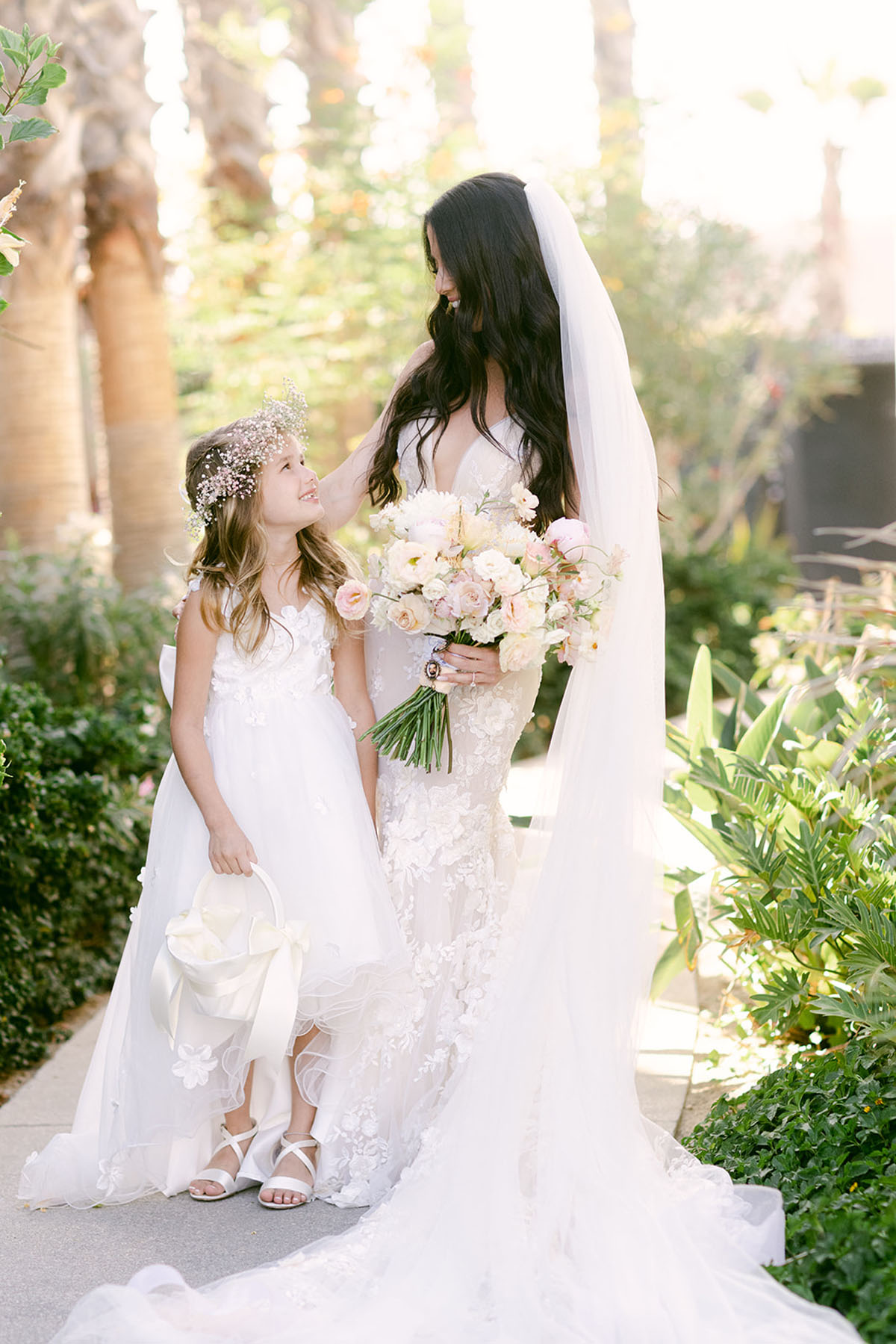 bride and flower girl for mexico wedding
