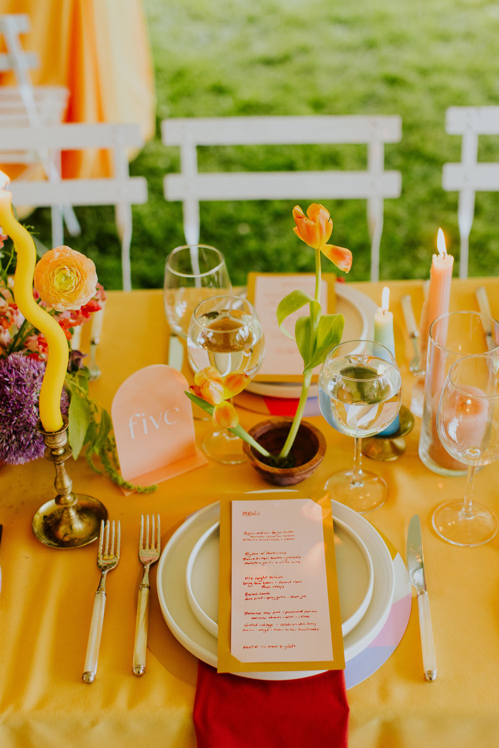 colorful place setting for outdoor wedding