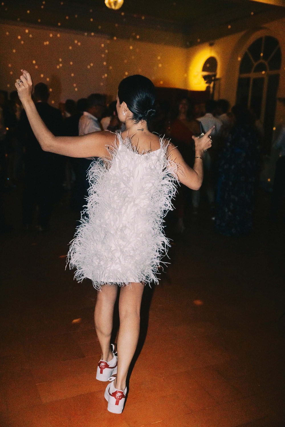 bride in fringe mini dress