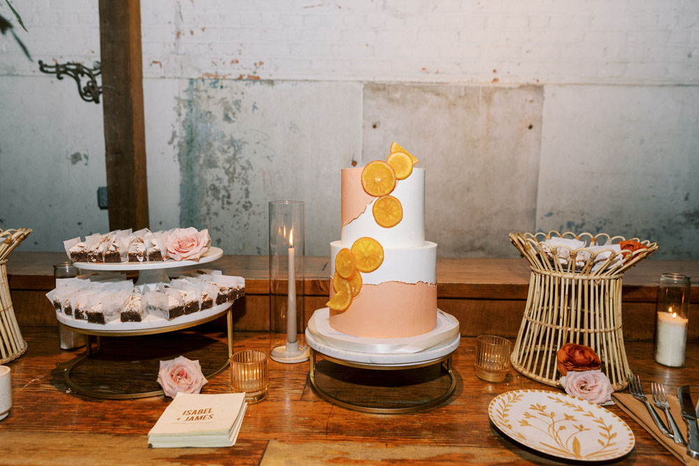 citrus cake and dessert table for wedding