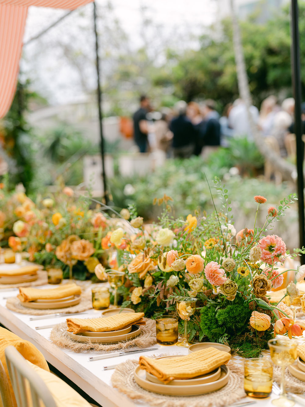 yellow place settings and flowers for spring tablescape