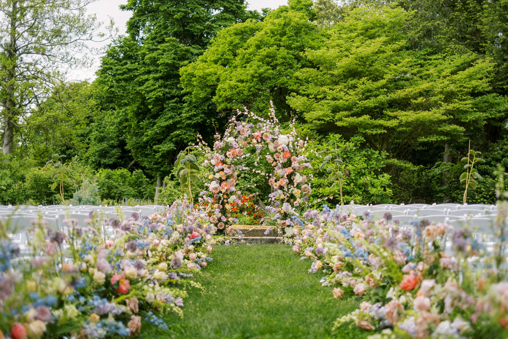gorgeous floral arch and ceremony flowers at kentucky spring wedding