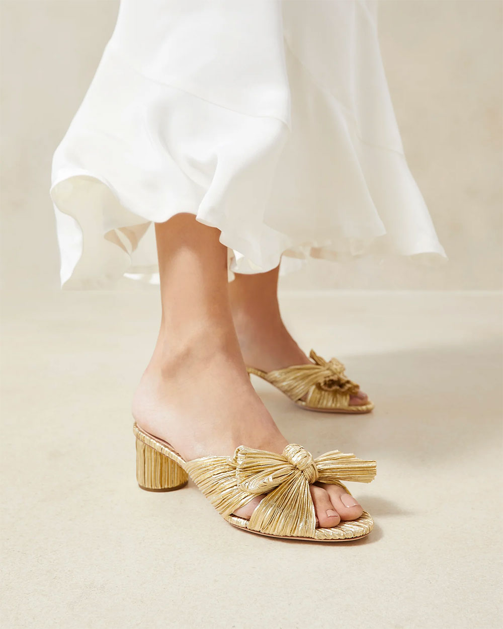 pleated gold bow heel