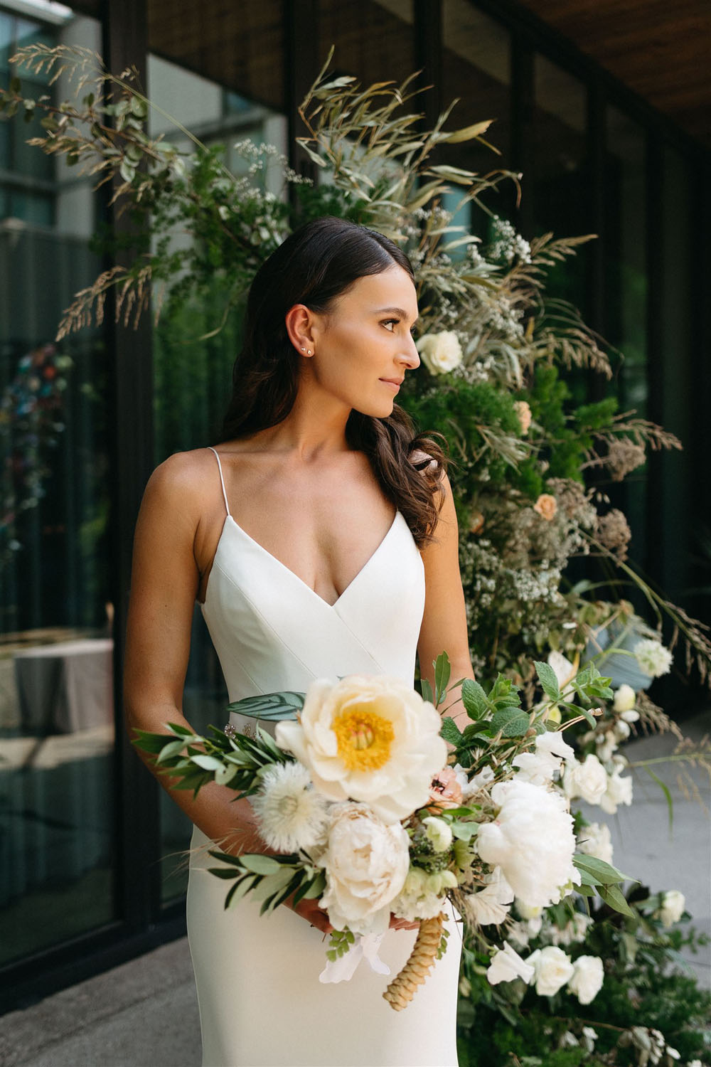 modern bride with peonies bouquet