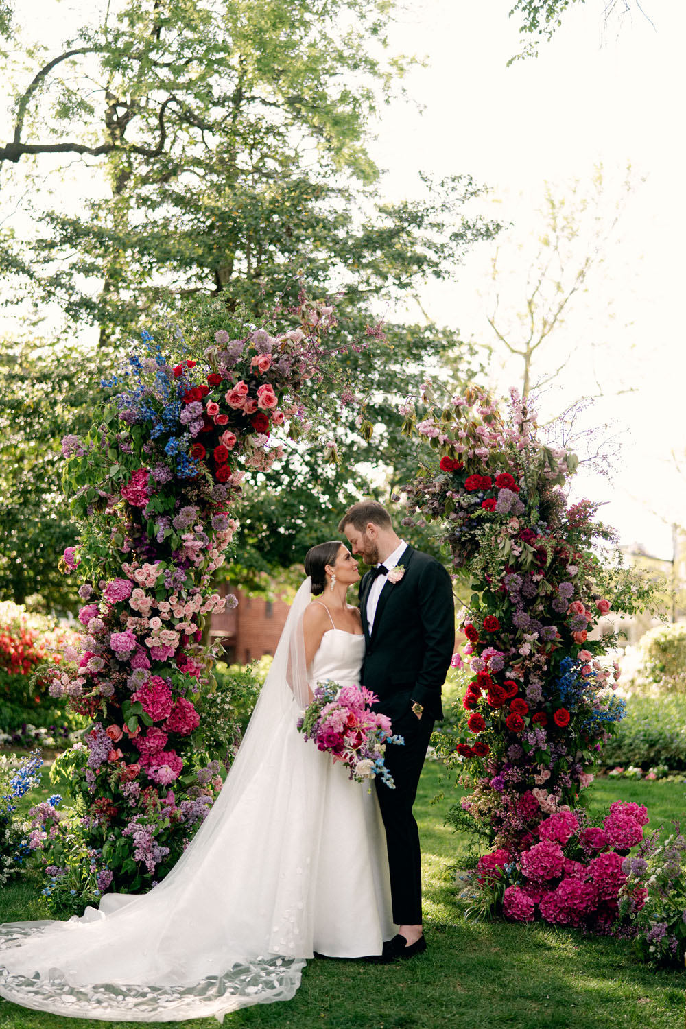 Romantic maximalist wedding with gorgeous floral arch