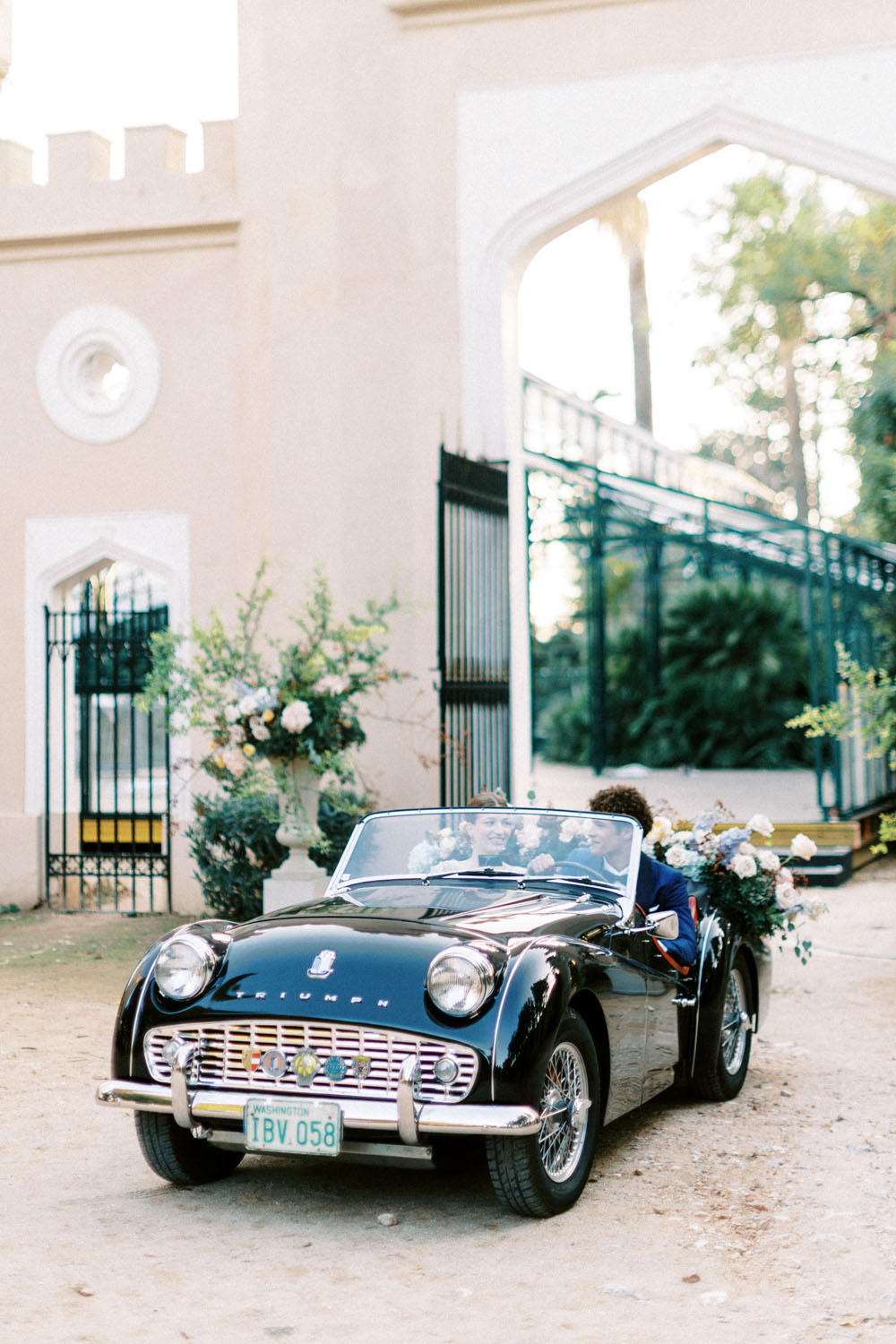 Vintage getaway car for elegant castle wedding in Athens