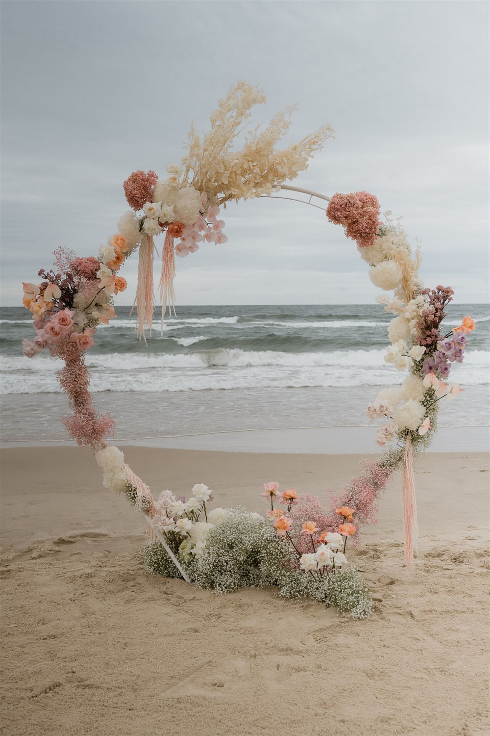 pink ceremony hoop for Australian beach wedding
