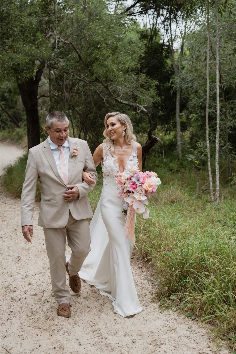 Punchy pink beach wedding in Australia