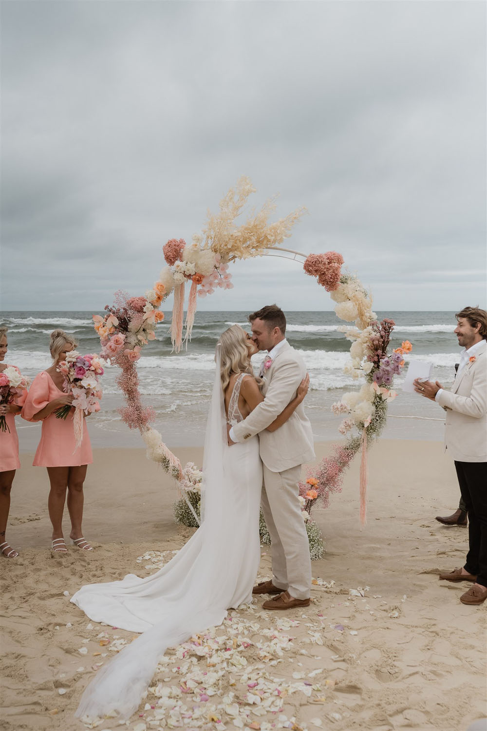 Coastal Australian wedding with pink bridesmaid dresses