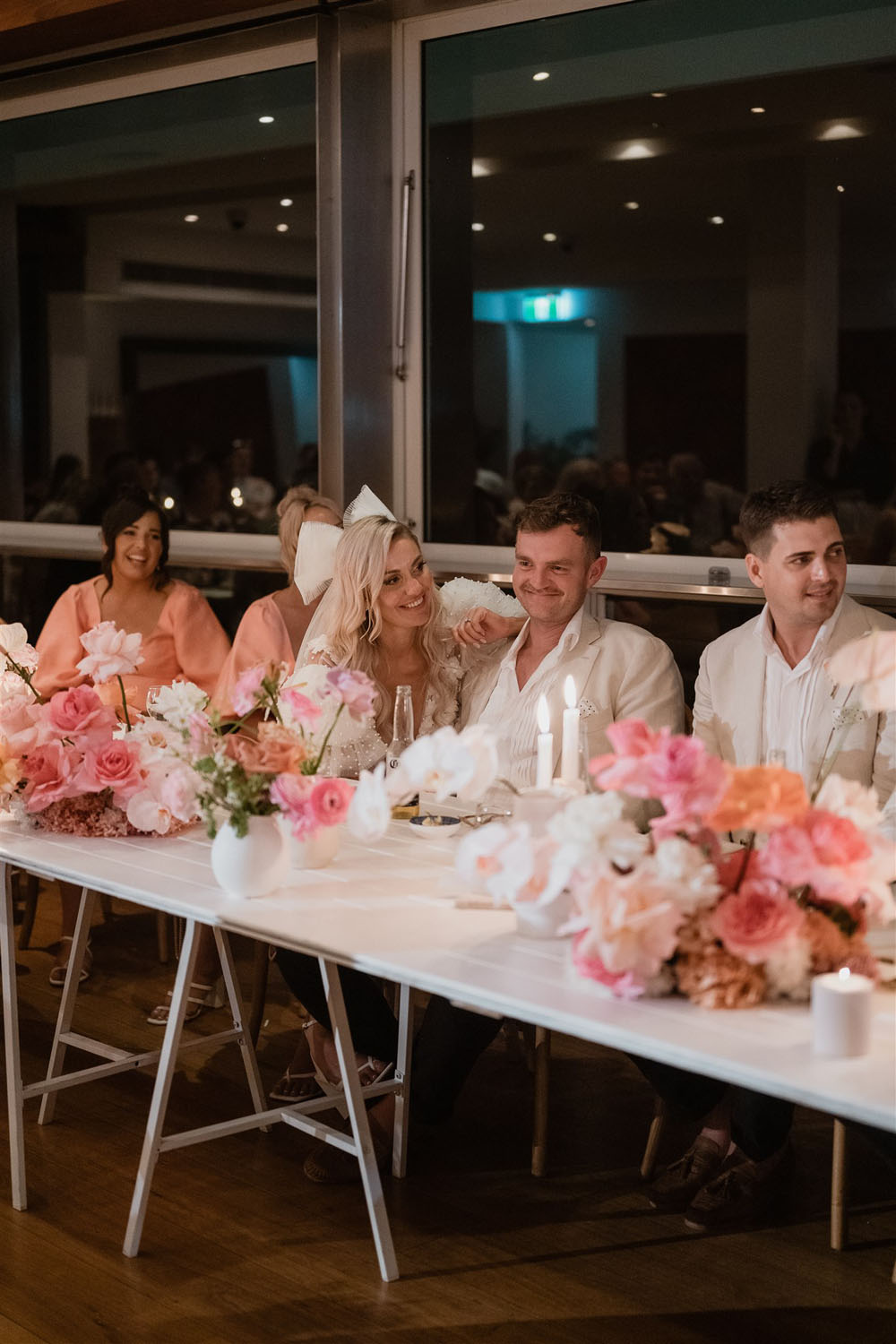 Coastal Australian wedding with pink bridesmaid dresses