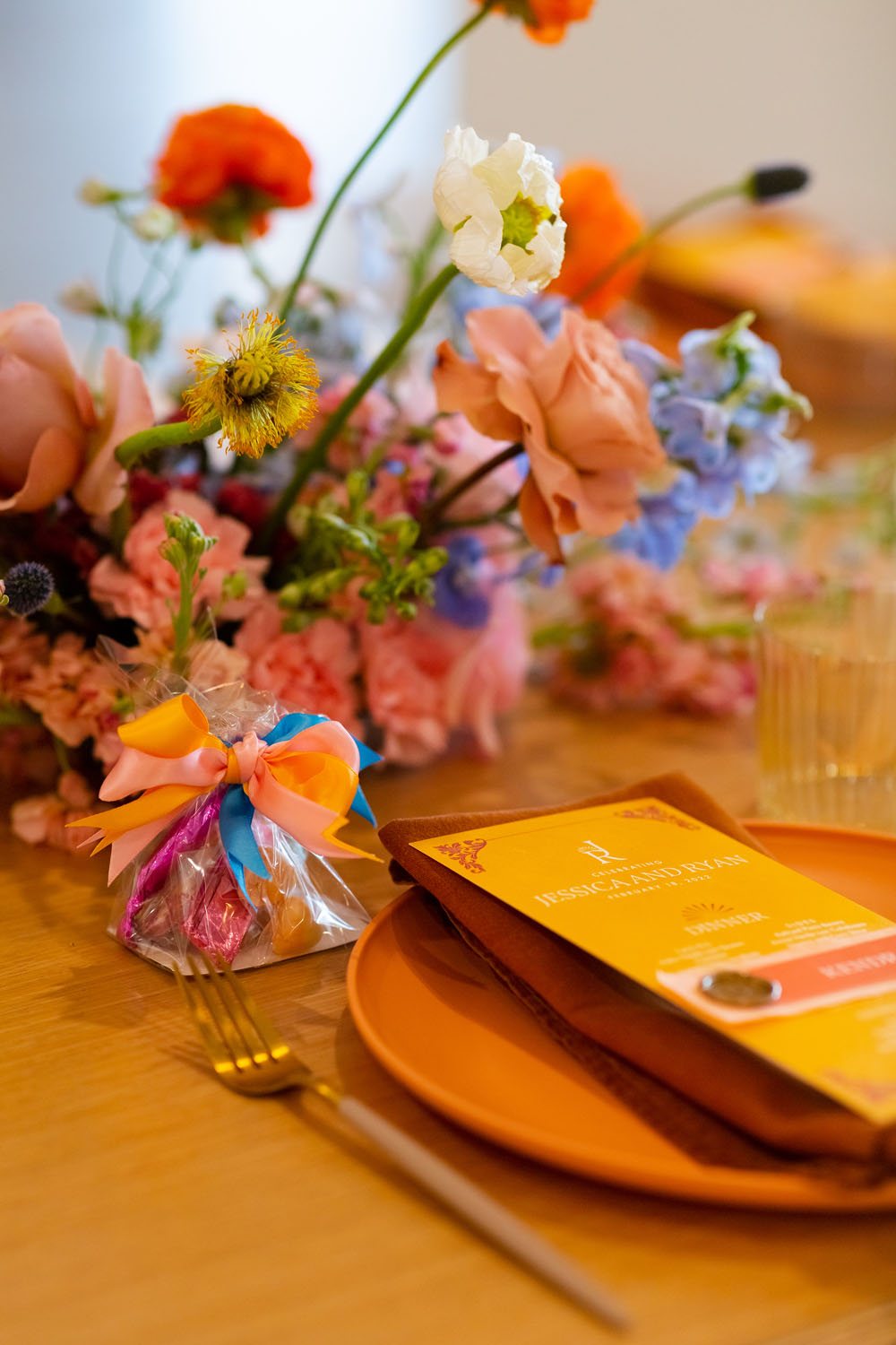 colorful place settings and menu for wedding