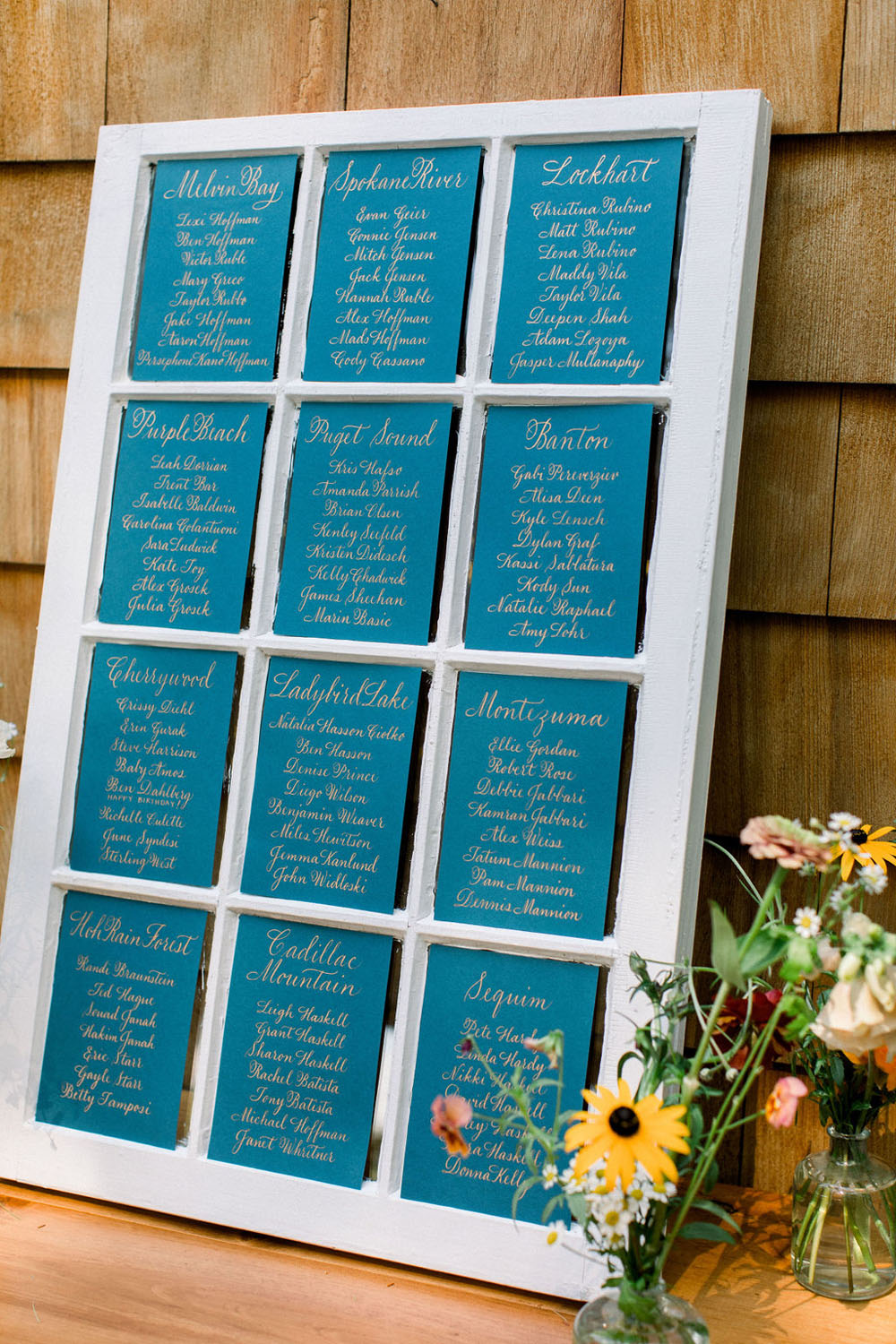 calligraphy seating chart at wedding