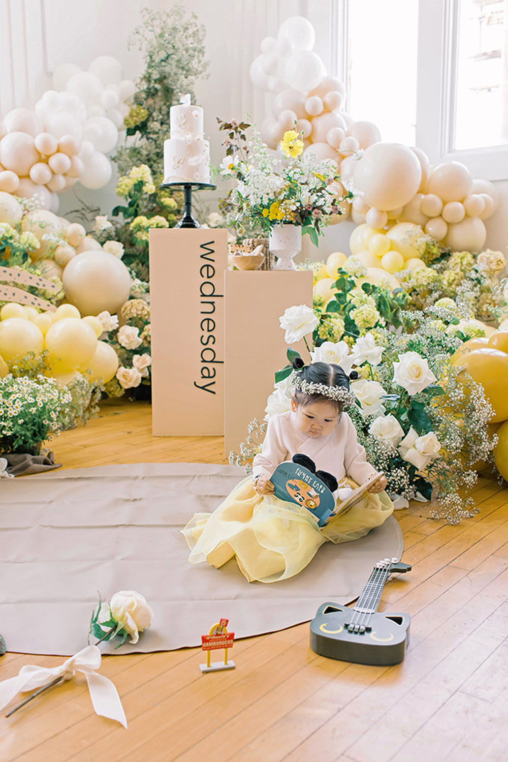 Yellow floral first birthday and Korean Dol