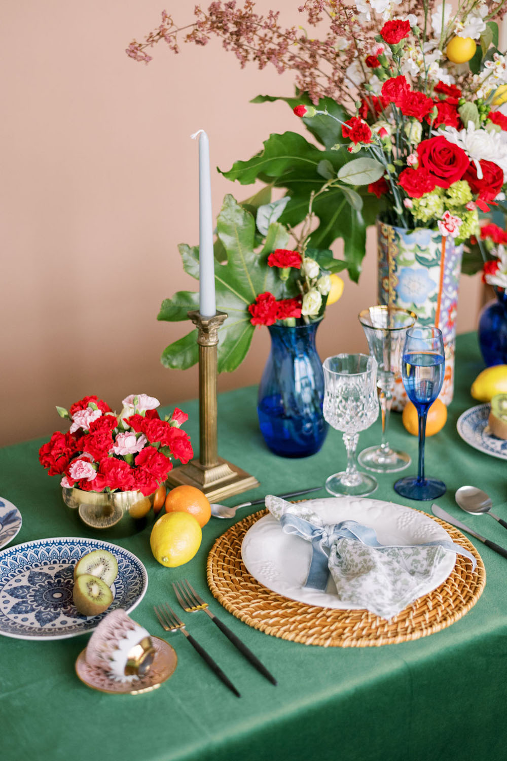 Blue glassware and mixed prints wedding tablescape