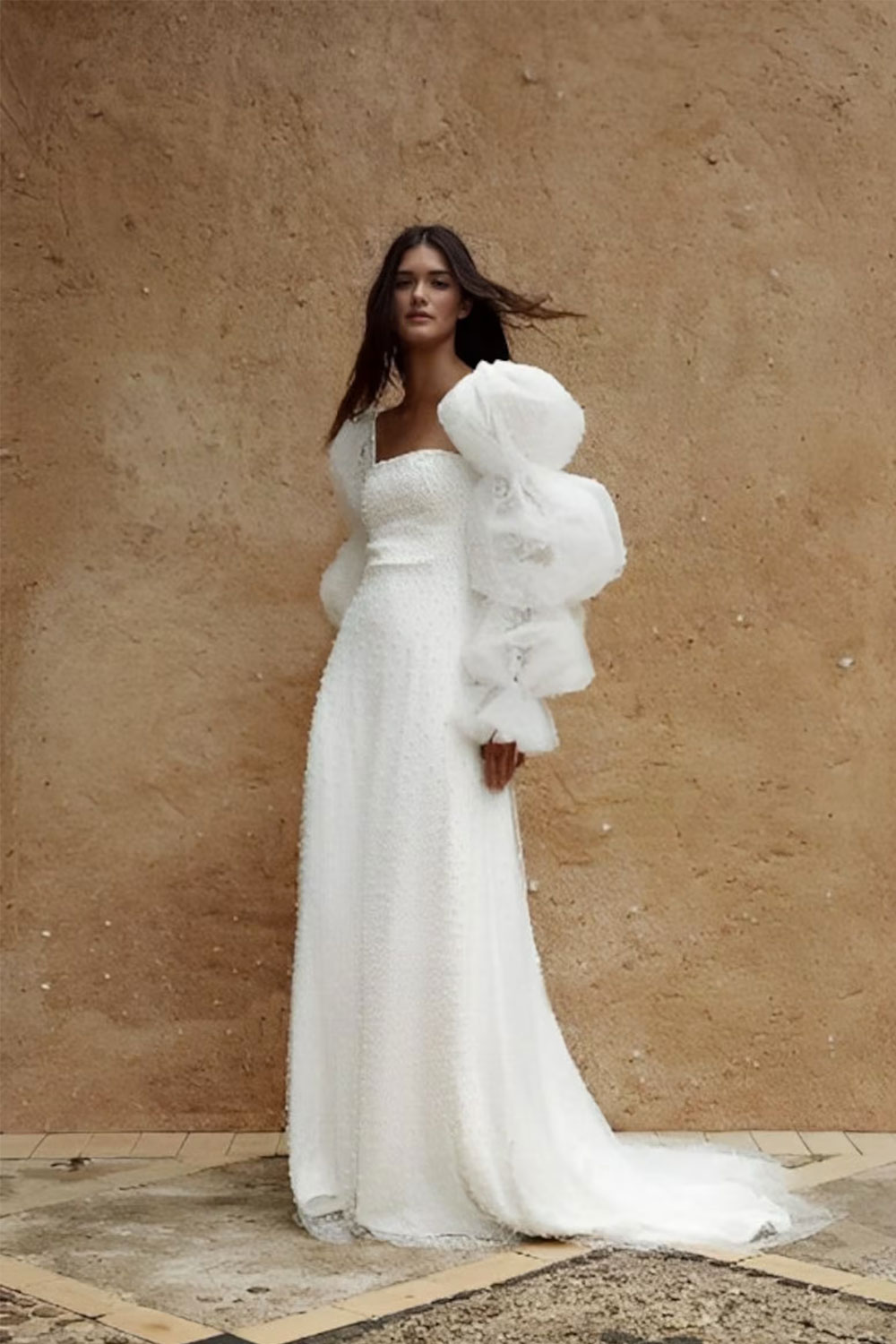 Dramatic puff sleeve wedding gown by WeddingHymns