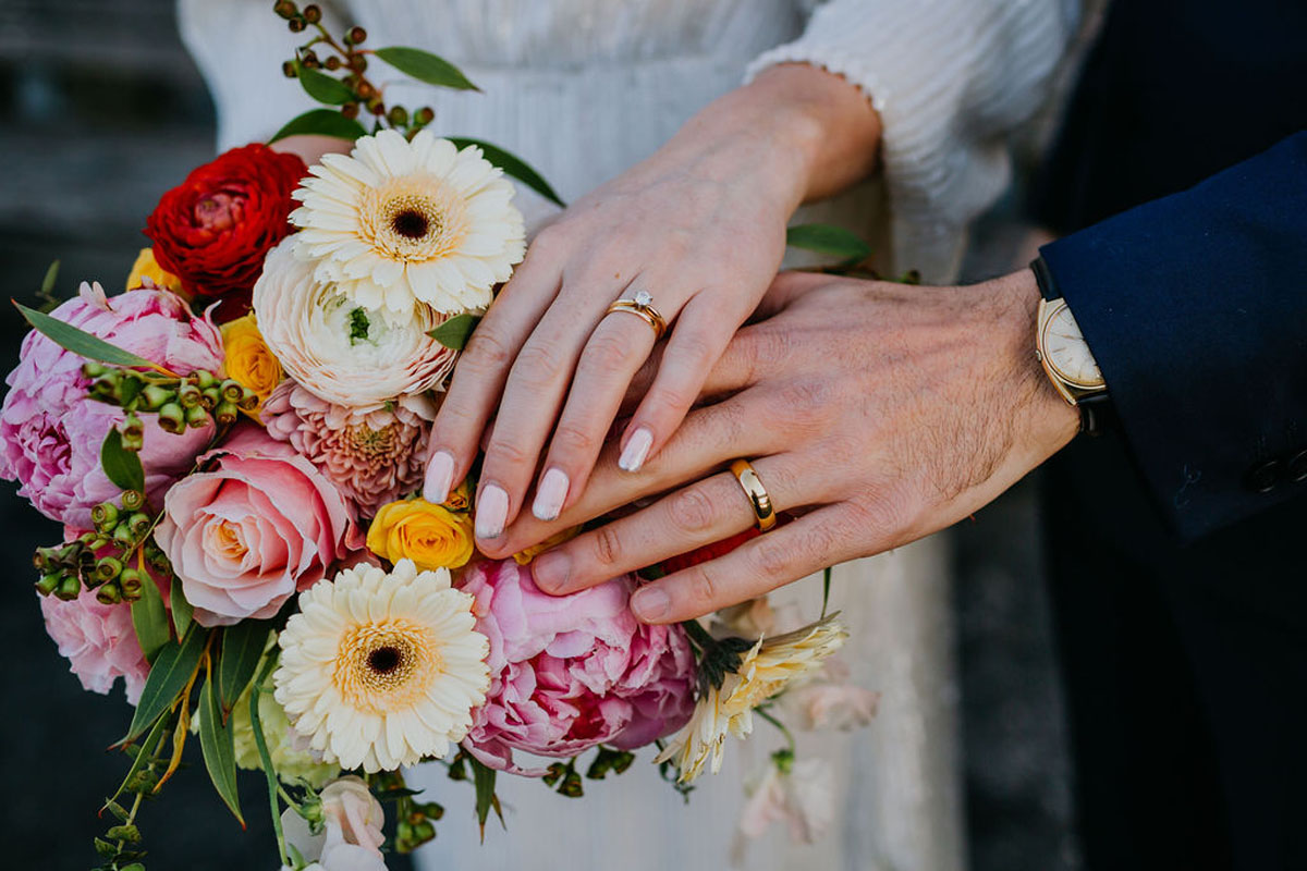 Wedding rings and bouquet