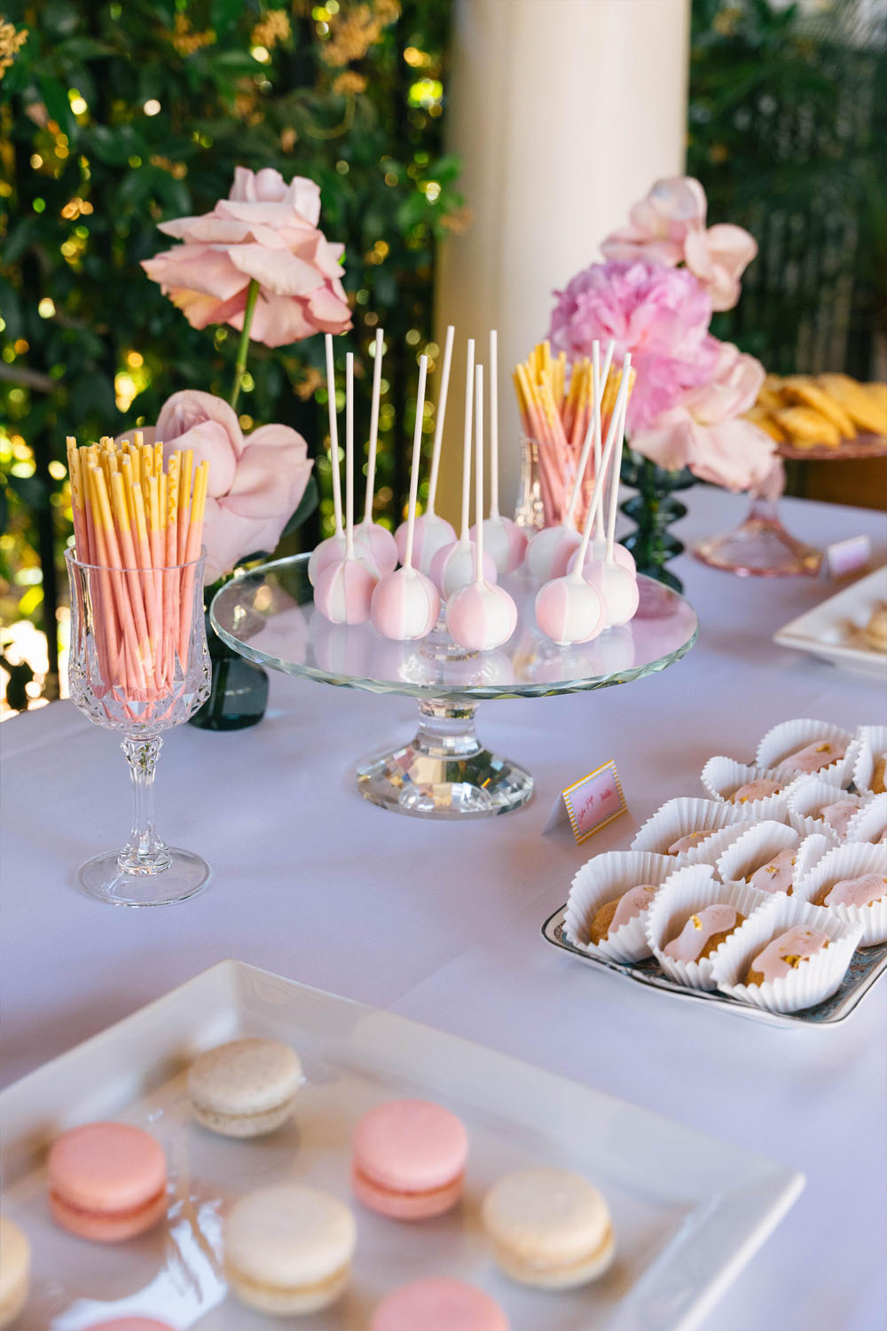 pink dessert table with cake pops
