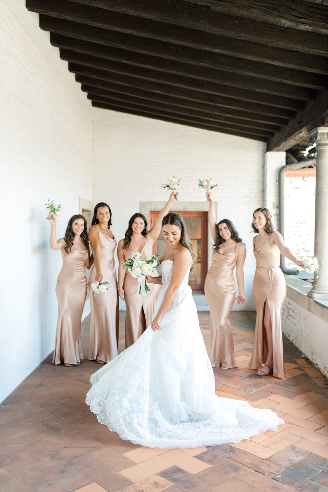 bridal party portrait with champagne bridesmaid dresses
