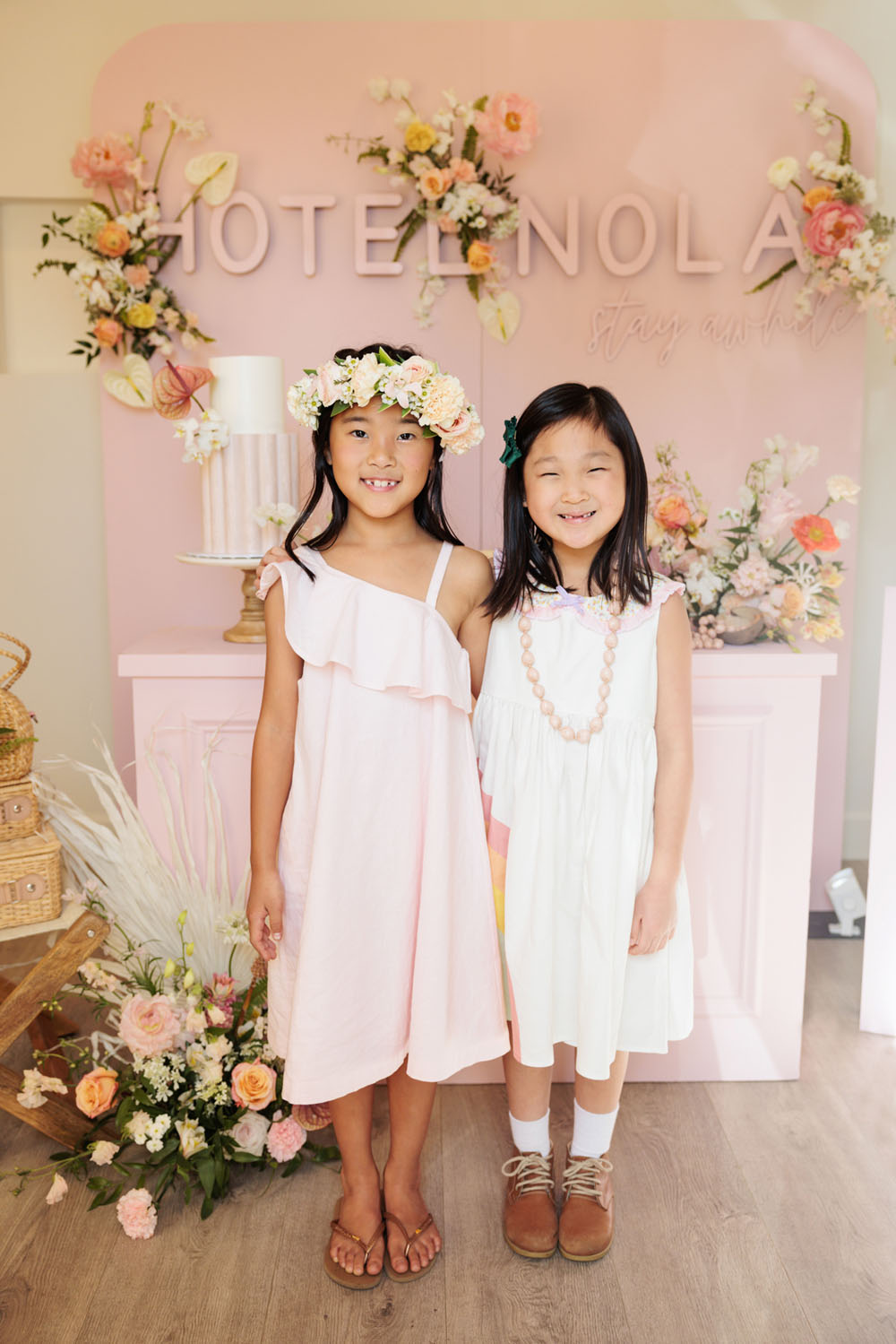 Pink Hawaiian-themed "Hotel Nola" kids birthday party