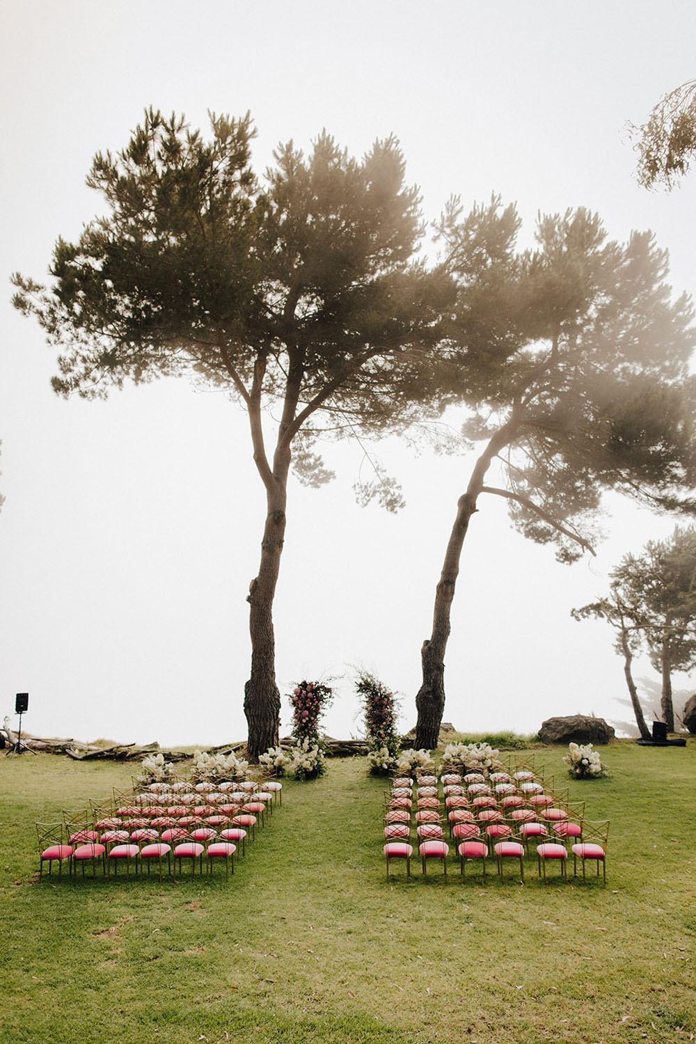 ombre pink chairs for wedding ceremony in Big Sur