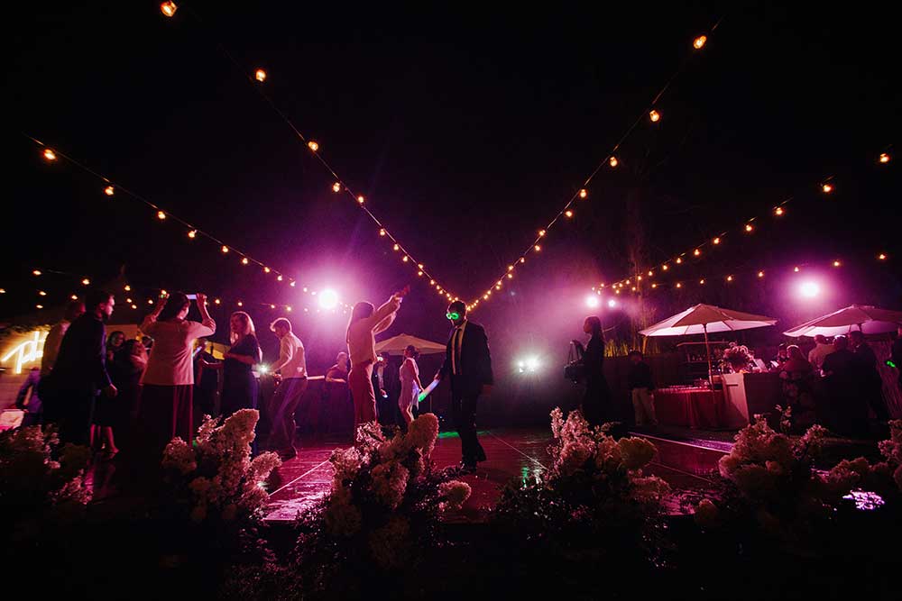 LED sunglasses and glow sticks at wedding dance party