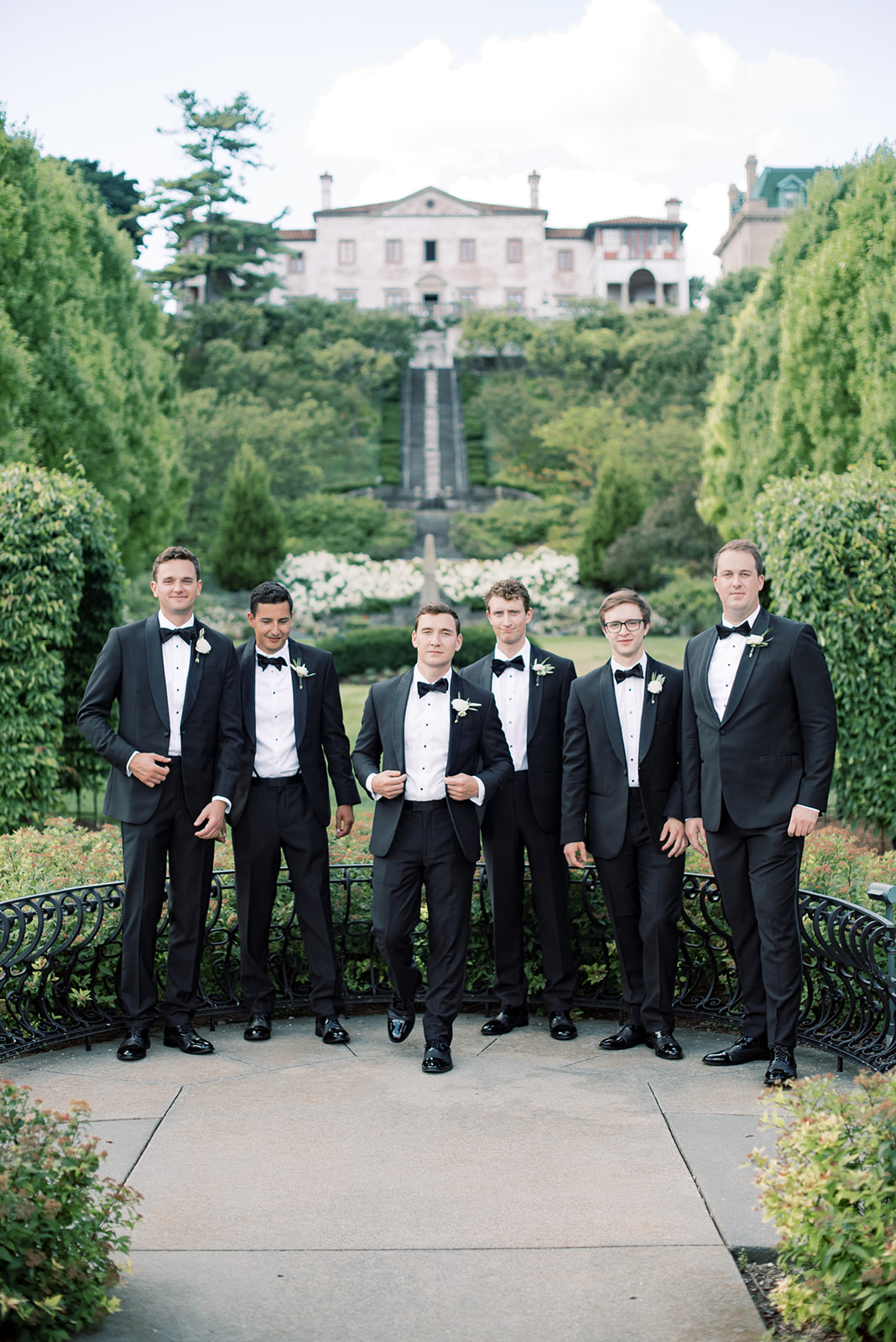 groom and groomsmen in tuxedos