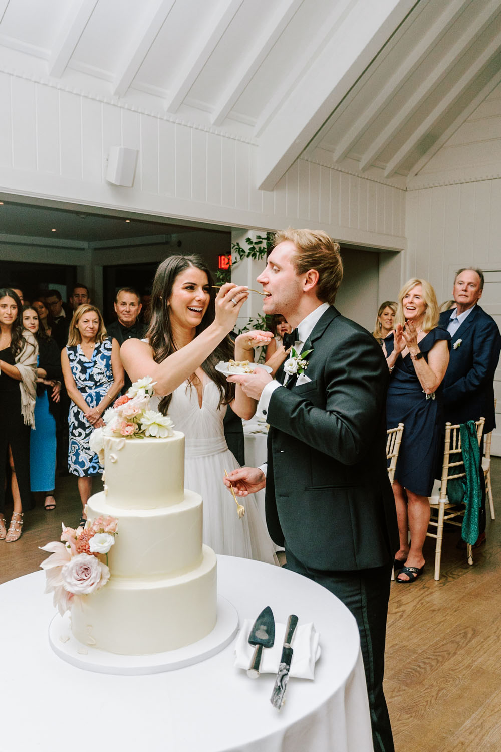 Romantic cake cutting at Hamptons wedding