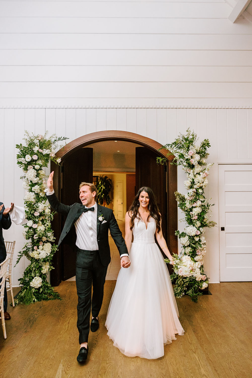couple reception entrance at Hamptons wedding