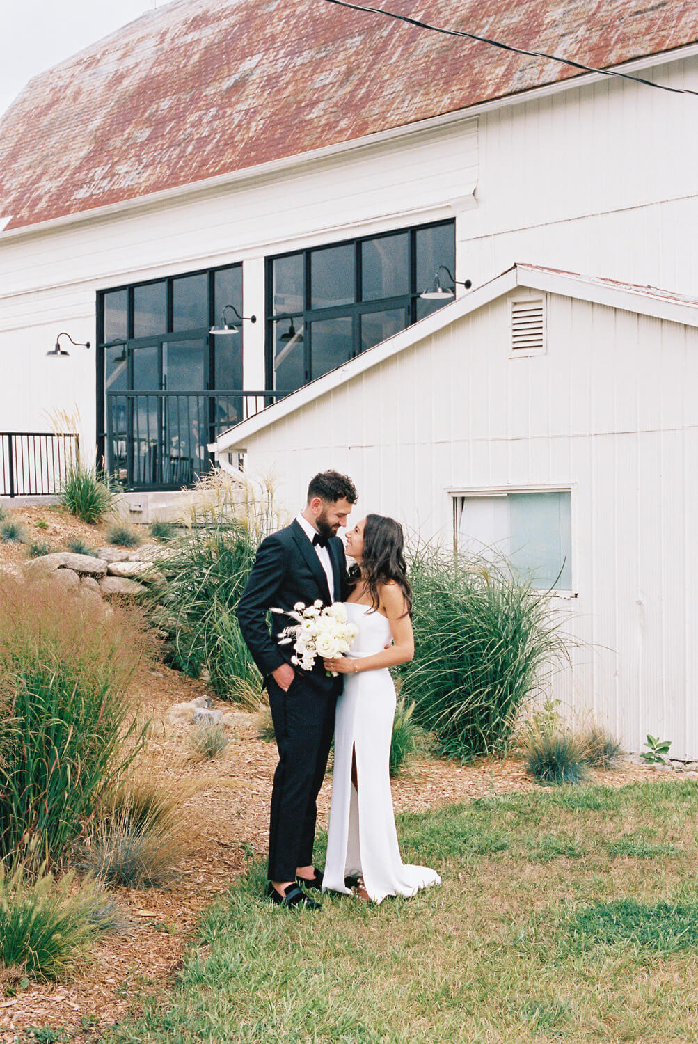 An all white Prince Edward County farmhouse wedding shot entirely on film