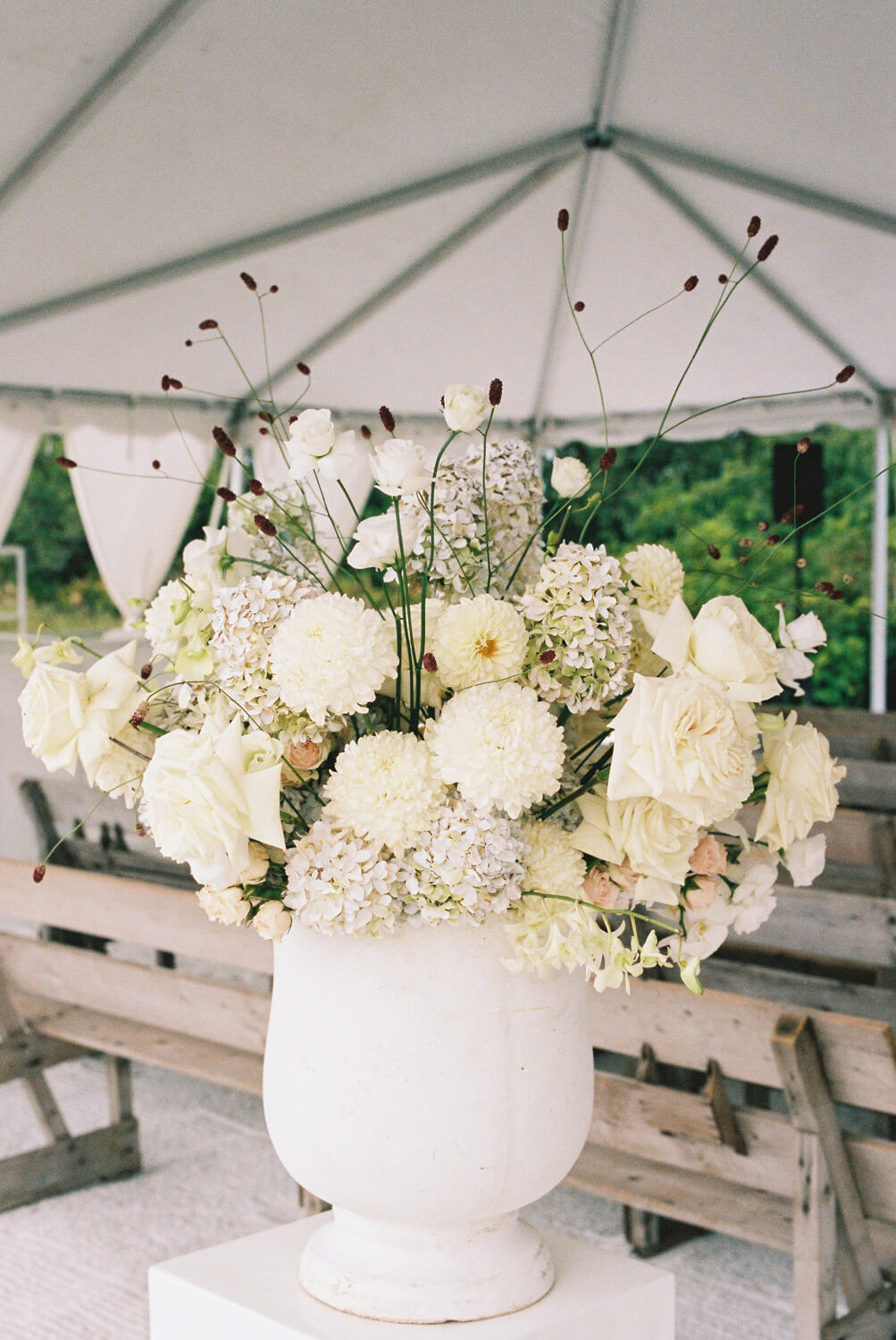 all white floral arrangements for farmhouse wedding in Prince Edward County