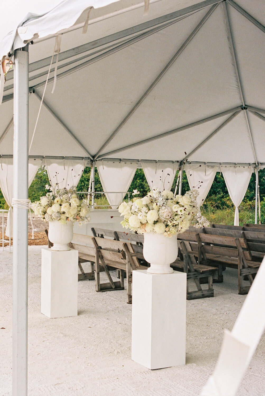 Tented wedding ceremony in Prince Edward County farmhouse