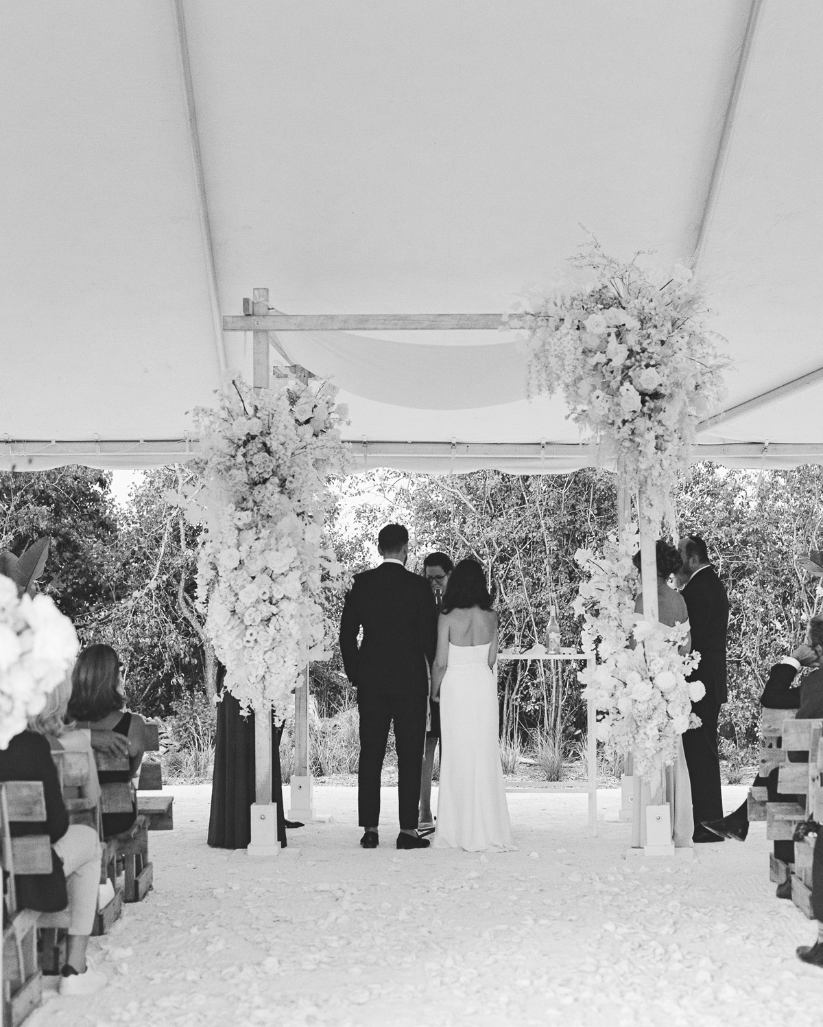 all white wedding chuppah flowers for modern jewish wedding ceremony