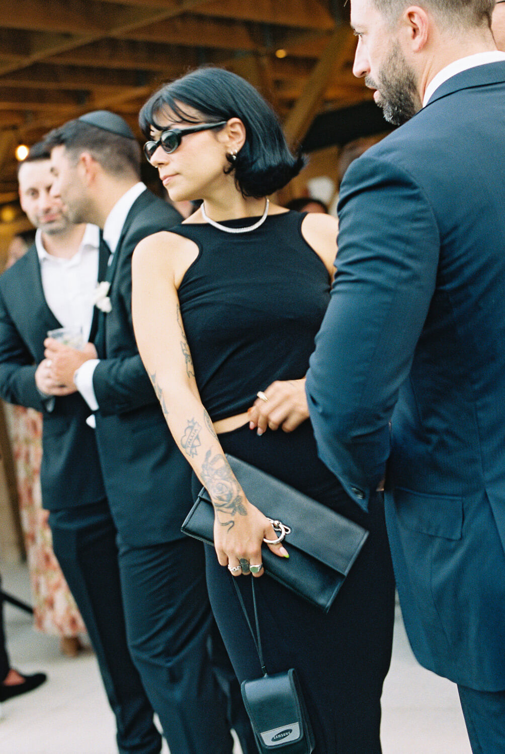 all black wedding guest fashion