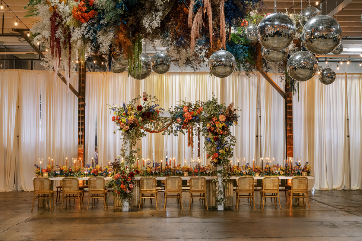 colorful disco ball wedding decor and flowers
