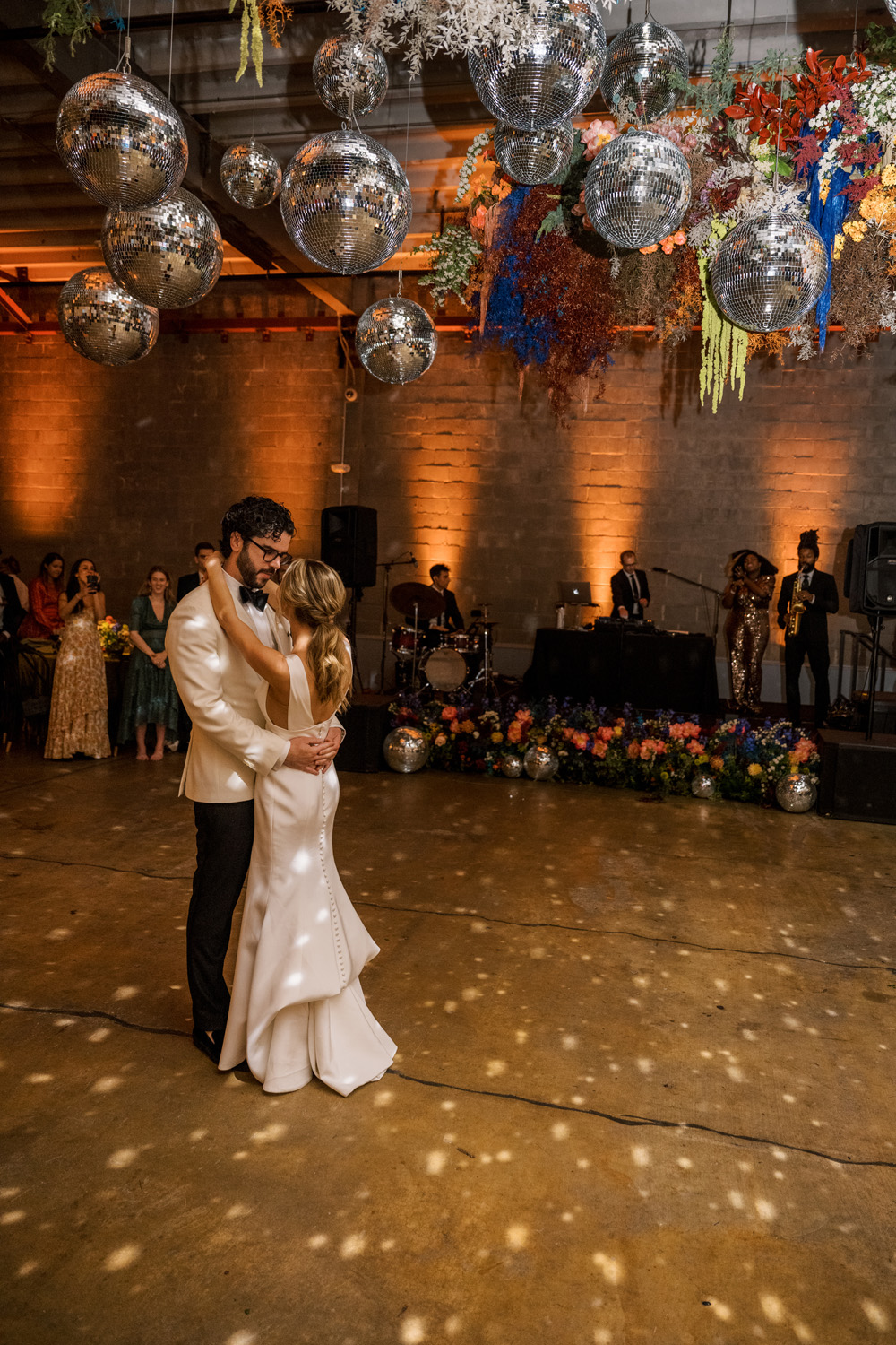 disco balls over dance floor in modern dc wedding