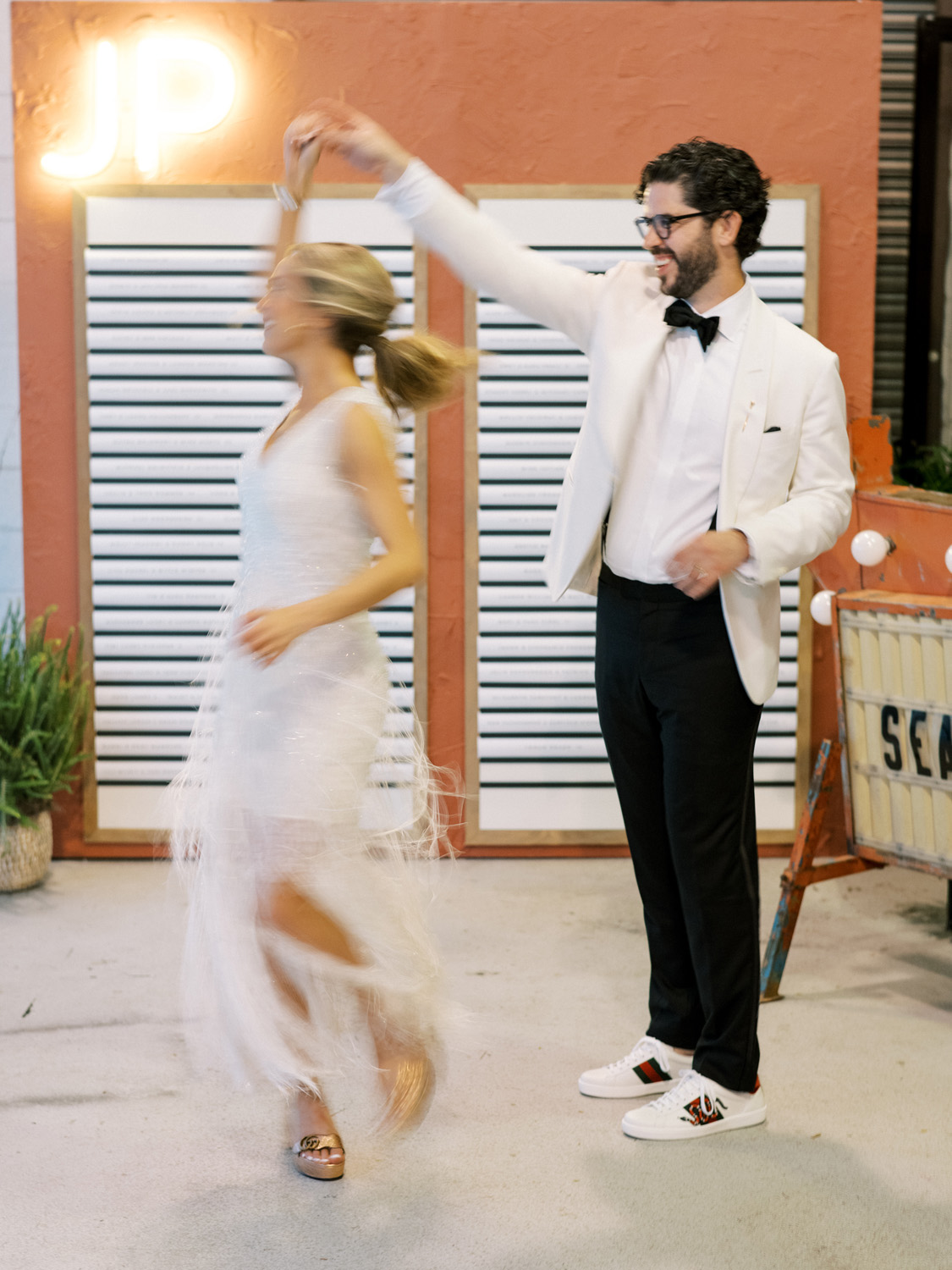 party dress and white tux for wedding reception