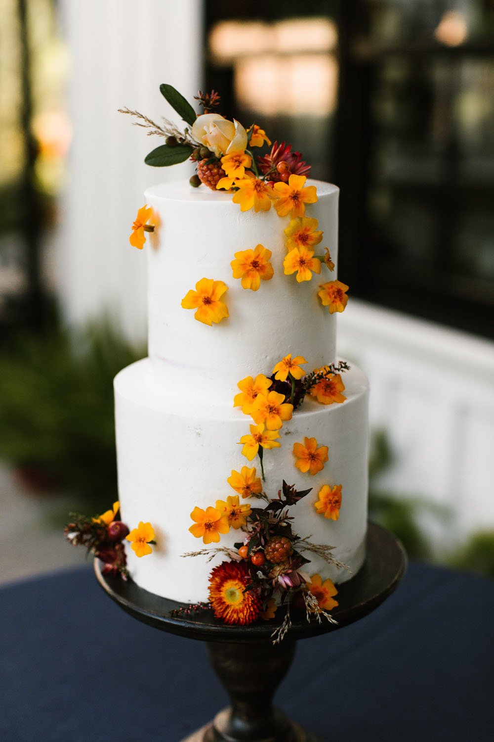 orange floral cake for california wedding