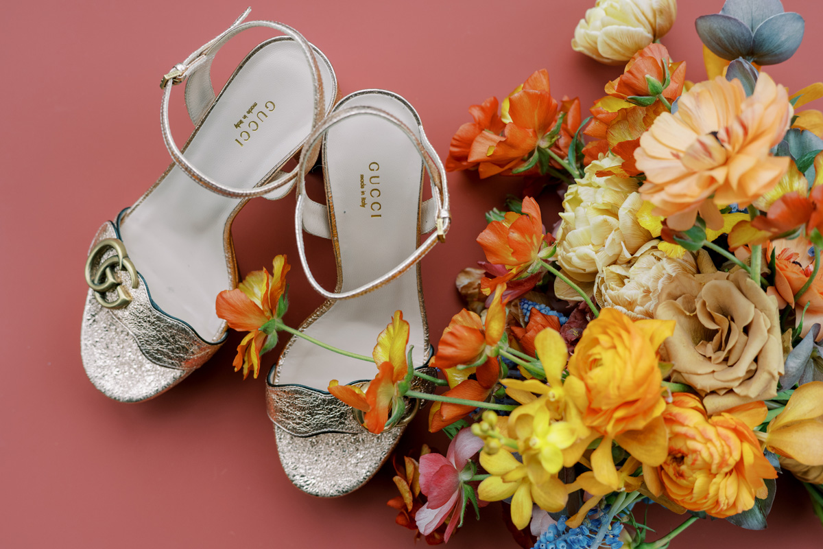 gucci wedding shoes and orange bridal bouquet
