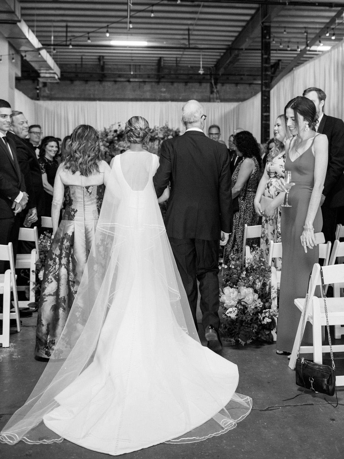 bride walking down the aisle in dc wedding ceremony