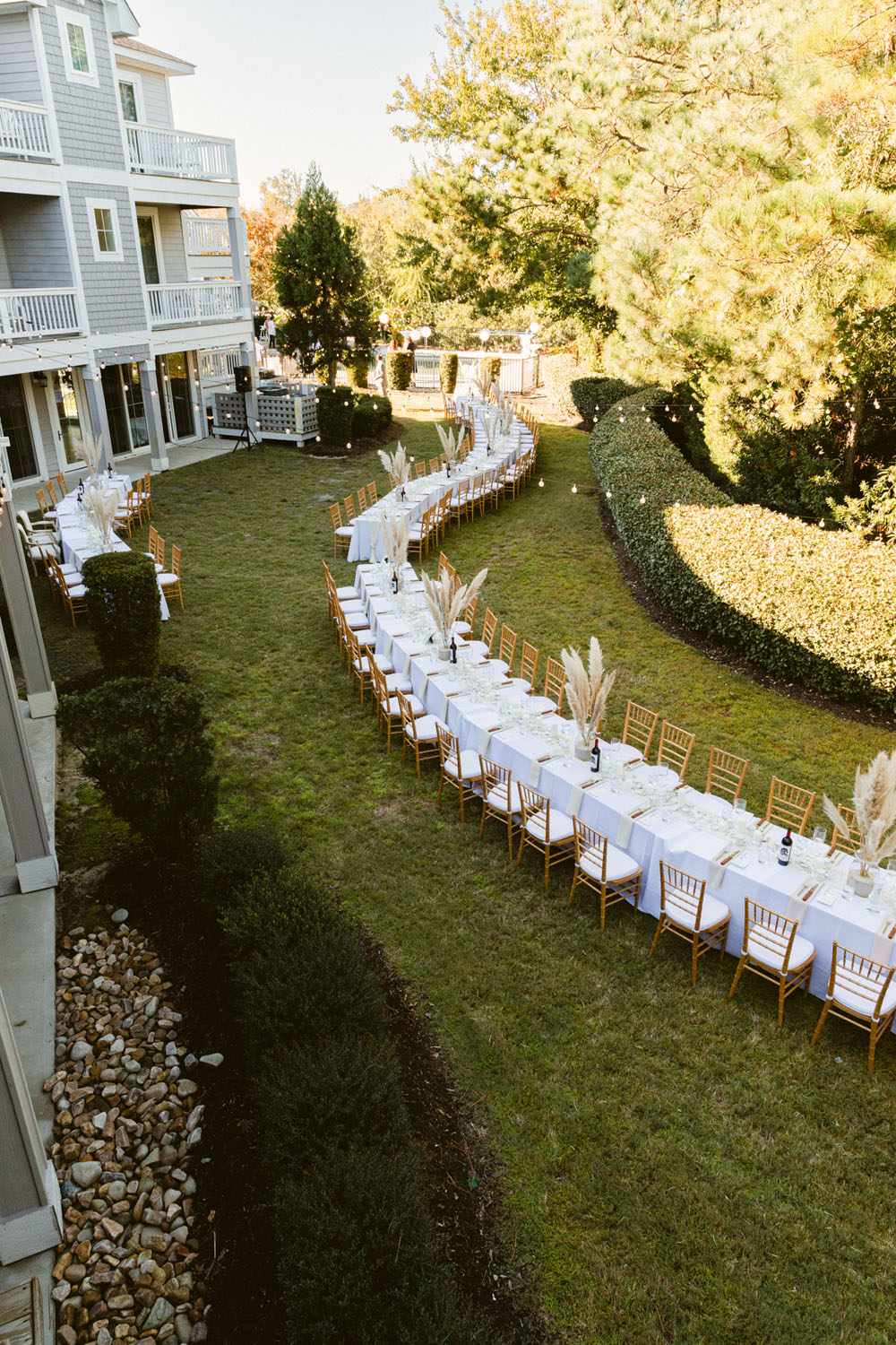all white long tablescape for coastal North Carolina wedding