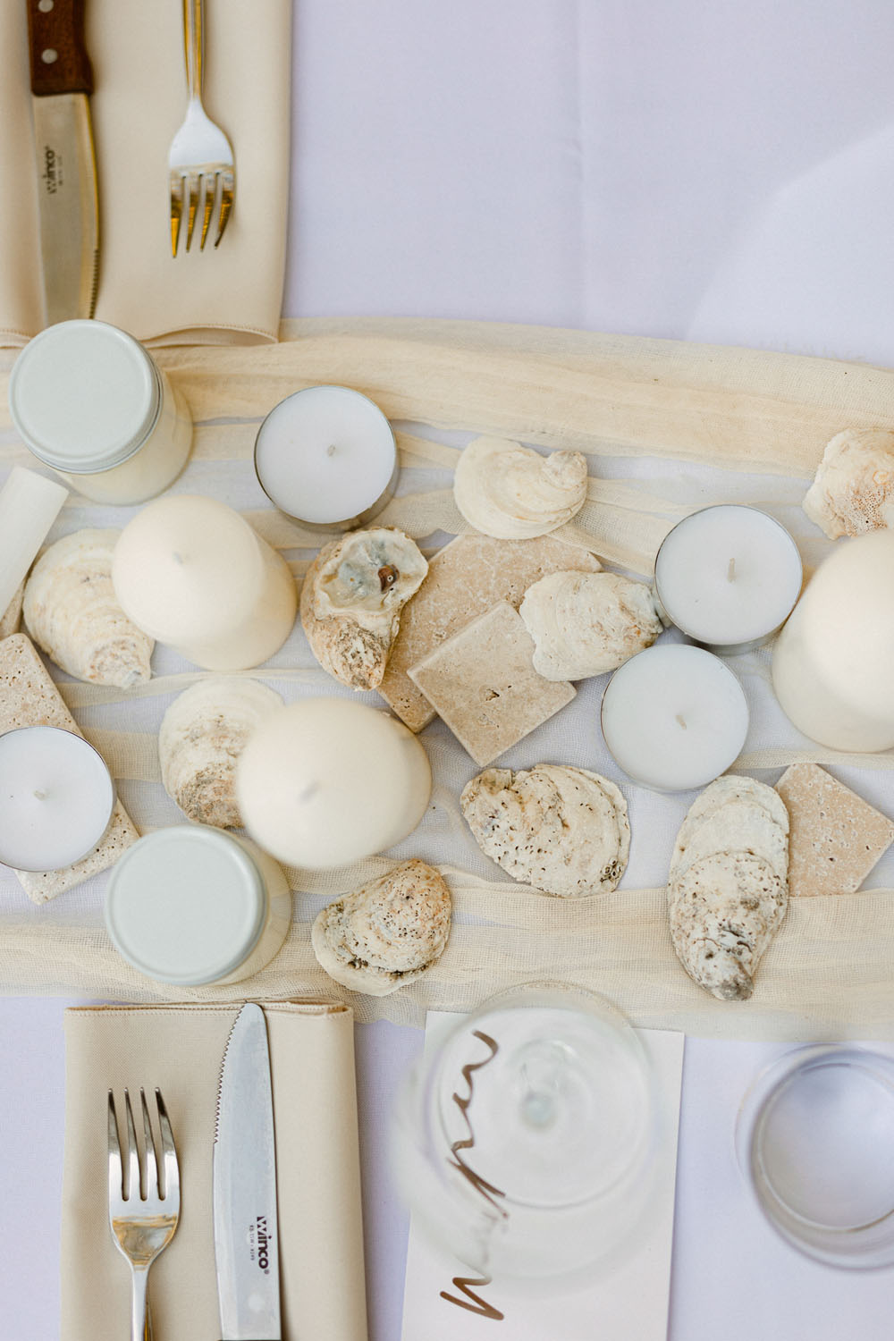 tealights and seashells for beach wedding