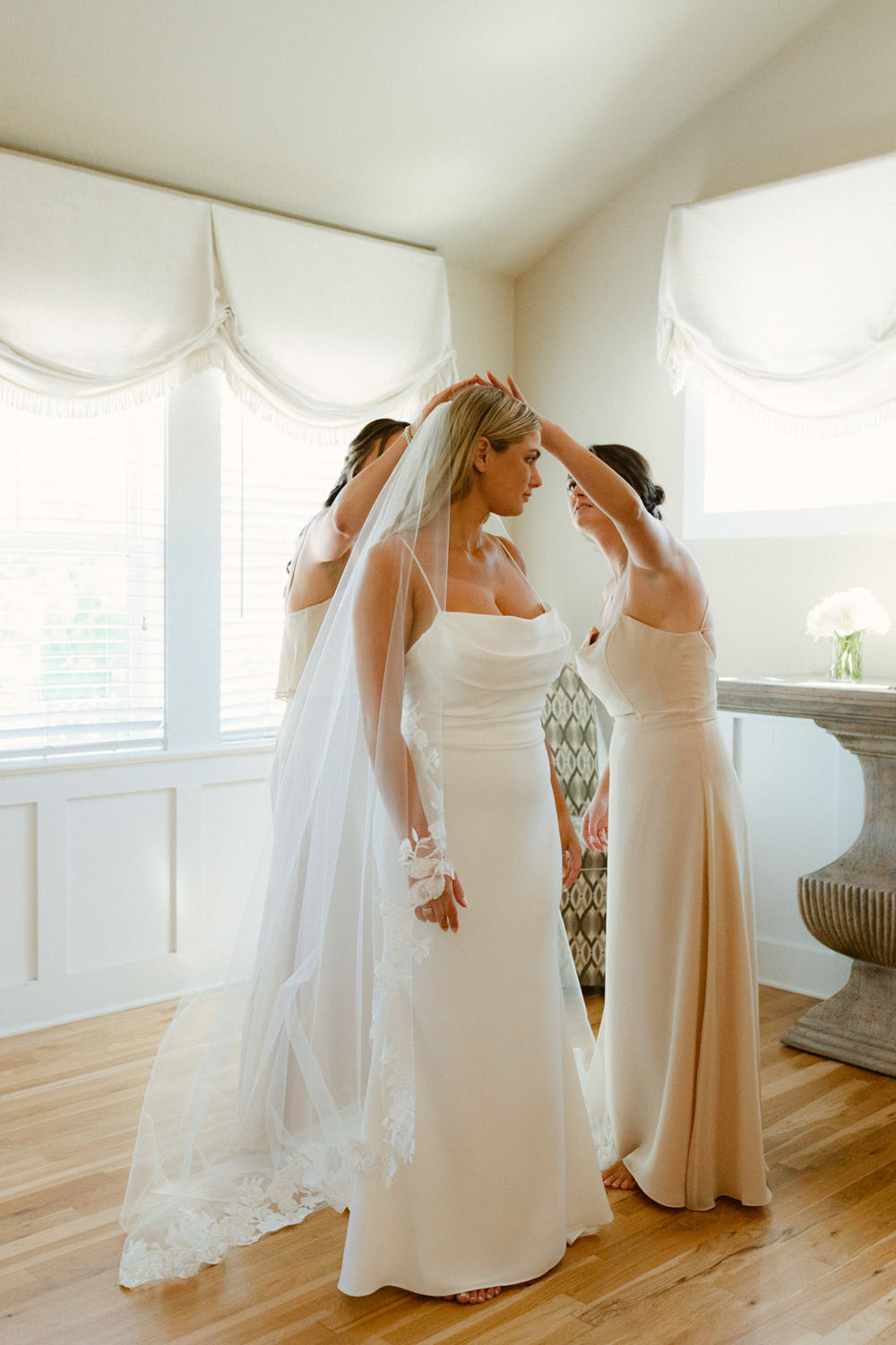 Bride getting ready at romantic coastal North Carolina wedding at The Currituck Club