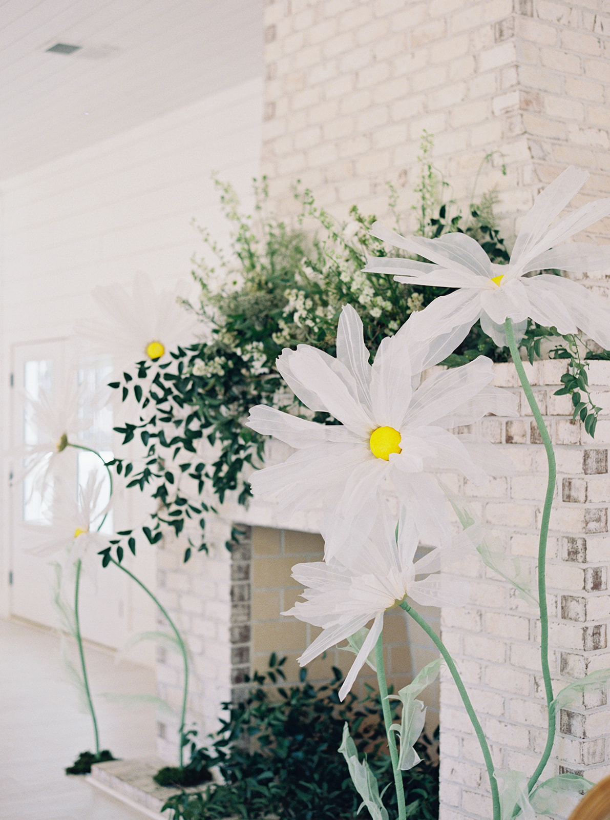 giant paper daisies for floral birthday party