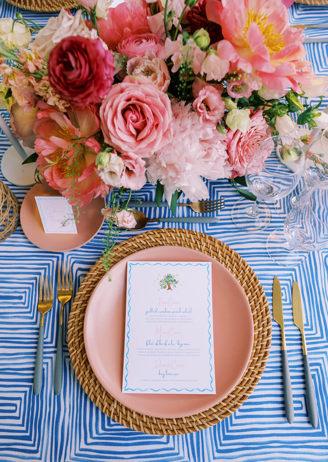 coastal pink and blue place setting for beachside wedding