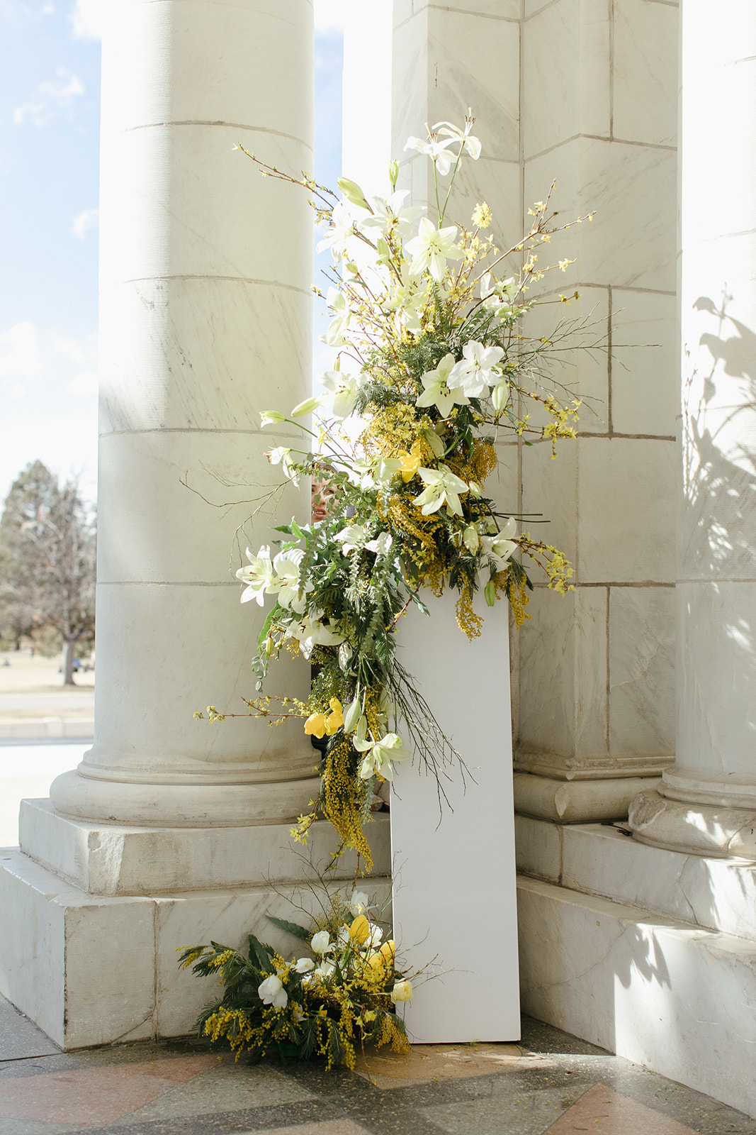 modern minimalist wedding ceremony with yellow flowers