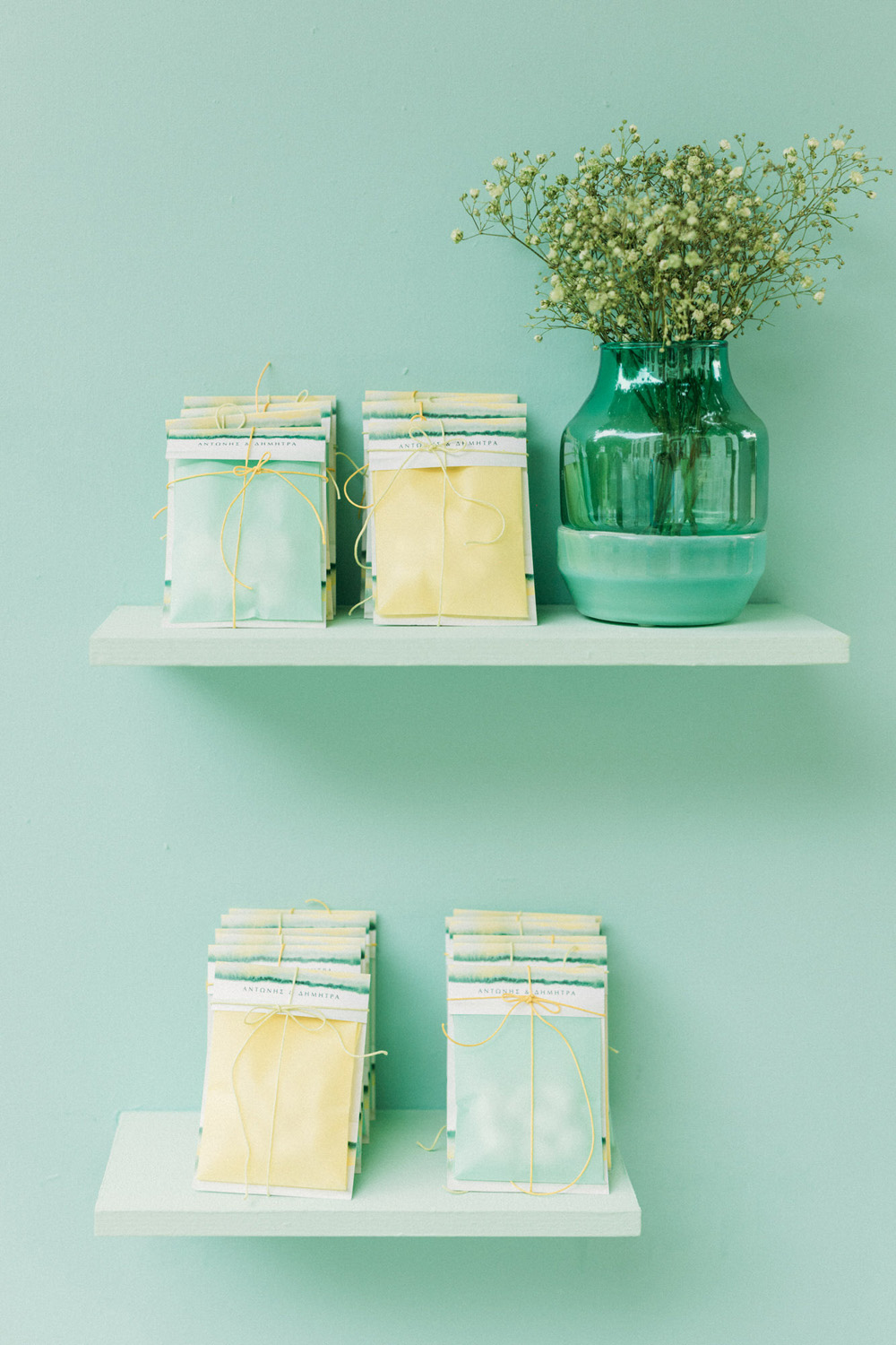 yellow, turquoise and lime green wedding favors table