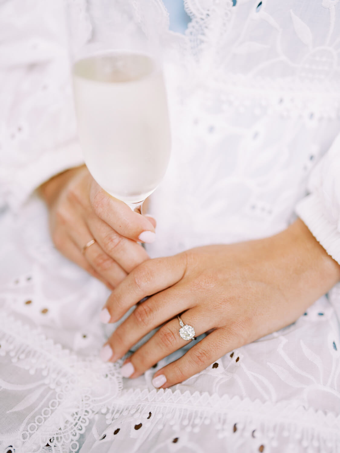 bride wedding ring and champagne