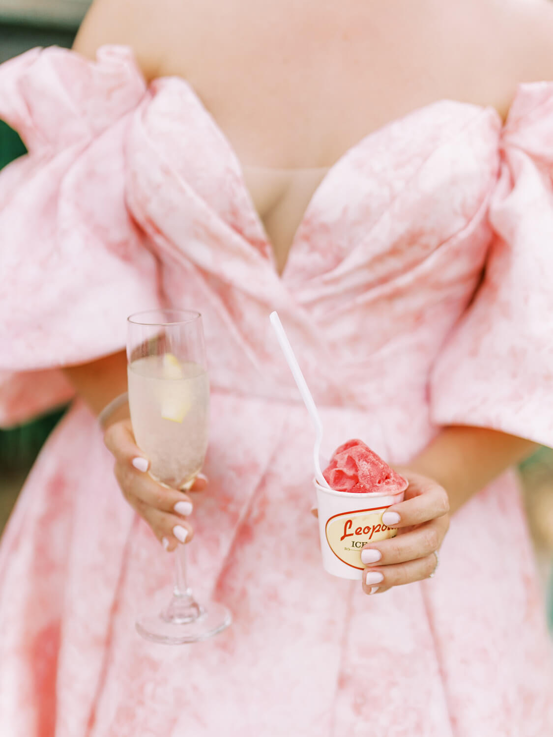 bride with ice cream and pink wedding dress